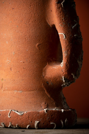 Old broken terracotta vase, handmade antique objectの写真素材