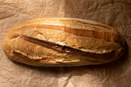 Homemade crusty whole grain bread. Genuine food products.Space for textの写真素材