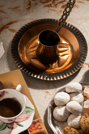 Turkish coffee with traditional sweets on antique carpetの写真素材