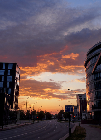 Enchanting sunset with bright colors and modern buildings in Klaipeda Street, Lithuaniaの写真素材
