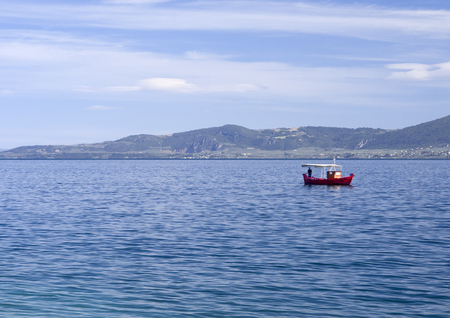 Fishing boat and fishing in the Aegean Sea in Greeceの写真素材