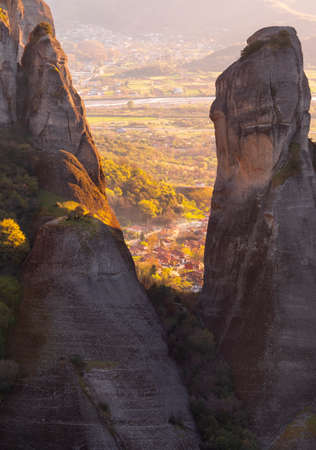 Meteora monasteries at sunrise, Greece. Landscape with rock formations.