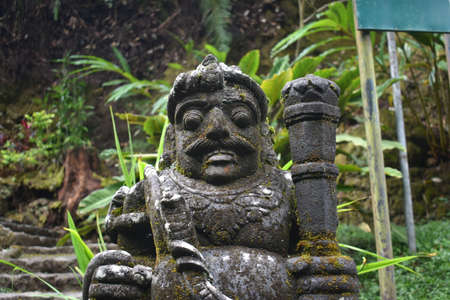 A Hindu statue at Parangijo Waterfall, Indonesia