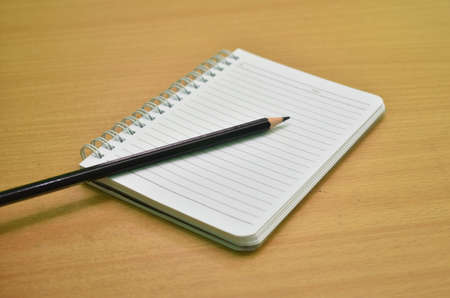 A notebook and pencilの写真素材