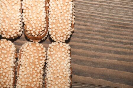 some biscuits lying on a wooden background
