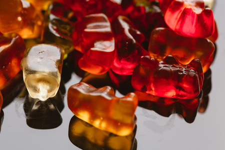 gummi bears close-up on a dark background.の写真素材