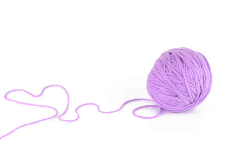 tangle of purple yarn for knittingの写真素材