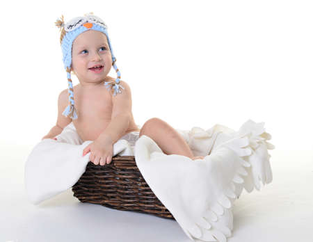 child, cap, owlet, basket, white, brown, background, studio, sits smiling, beautiful, の写真素材