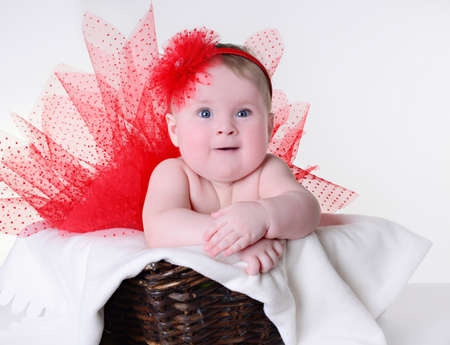 beautiful girl in a red skirt and headbandの写真素材