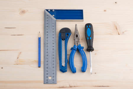 Tools on a wooden backgroundの写真素材