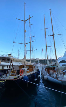Boats, yachts are moored. View from the shore to the yachts. Boat parking. Evening. Beautiful...