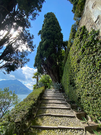 Botanical garden in the city of Varenna, Italy. A picturesque place in the mountains. The park. Giardino Botanico Di Villa Cipressi. Tourismの写真素材