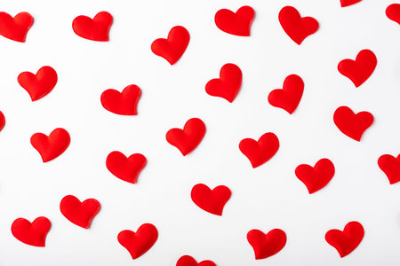 Seamless pattern of red hearts on white background