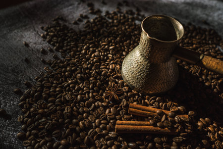 coffee, cinnamon sticks and spices on brown wooden board 2の写真素材