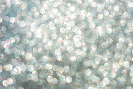 Abstract glitter lights textured silver, gray and white colored background, de-focused, bokeh....
