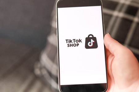 Antalya, Turkiye - 16.08.2024 - Smarphone with Tik Tok mobile application on screen in female hand...