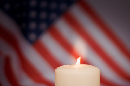 Memorial Day Banner with candle and the United States official flag on background.の写真素材