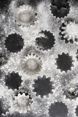 Baking cups and flour on the table
