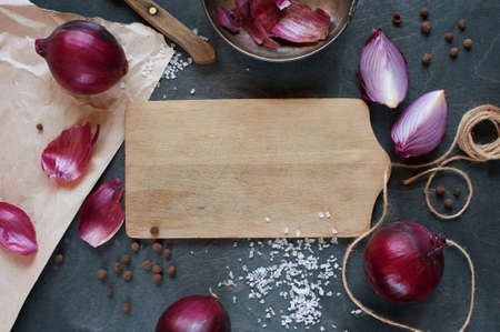 Red onions on the wooden tableの写真素材
