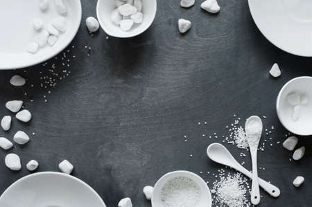 White crockery on  the black wooden tableの写真素材