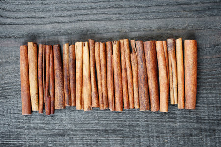 Chinnamon sticks on the wooden tableの写真素材