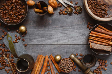 Wooden background with turkish coffe and spicesの写真素材