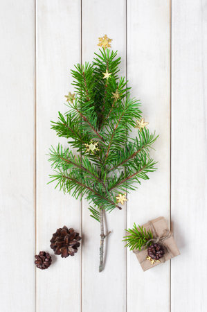 Small Christmas tree with decorated gift box