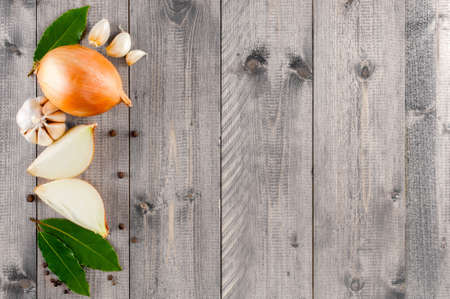 Wooden background with Ingredients for cooking, top view and copy spaceの写真素材