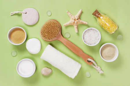 Composition of bath accessories on the green background, flat layの写真素材