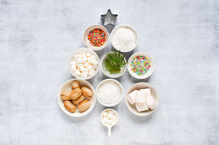 Festive Christmas tree made of plates and food, art compositionの写真素材