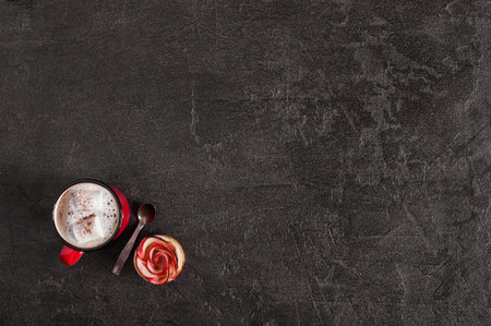 Background with mug of hot drink with marshmallow and cake, copy space