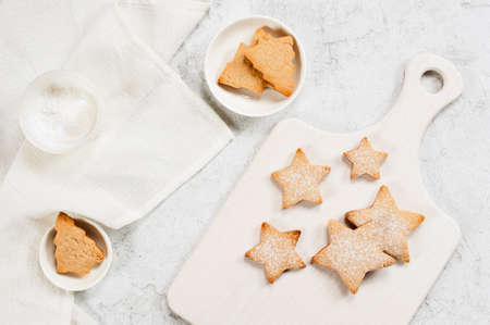 White winter composition with cookies - stars and firsの写真素材