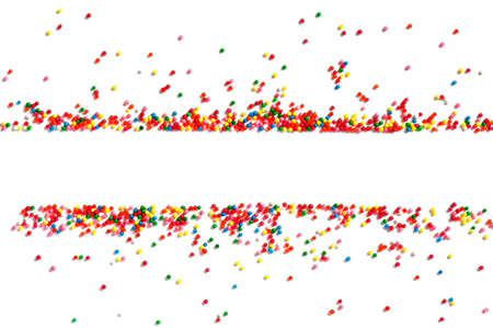 Bright festive background of multicolor candy, isolated on whiteの写真素材