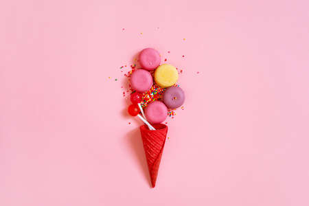 Concept of candy ice cream in the red waffle cone, bright compositionの写真素材