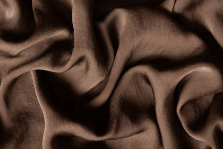 Texture of soft and shiny brown silk, top viewの写真素材