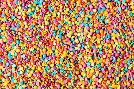 Texture of multi color confectionery sprinkles, top viewの写真素材