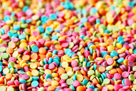Texture of multi color confectionery sprinkles, top viewの写真素材