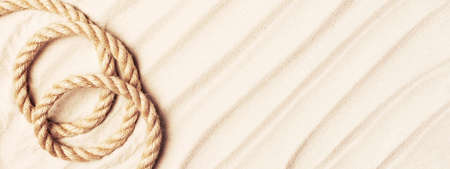 Banner of sand decorated with rope, summer travel conceptの写真素材