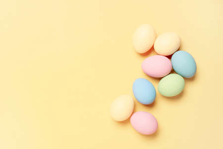Easter background with colored pastel eggs, holiday cardの写真素材