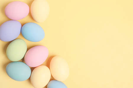 Easter background with colored pastel eggs, holiday cardの写真素材