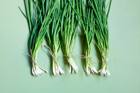 Green onions, fresh greens on the table, organic foodの写真素材