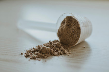 Chocolate protein powder and protein drink with scoops. Nutritional supplement for athletesの写真素材