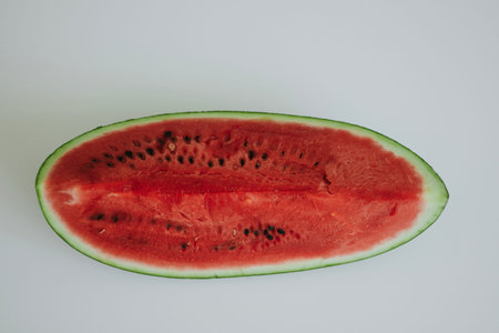 a large cut piece of juicy and sweet watermelon
