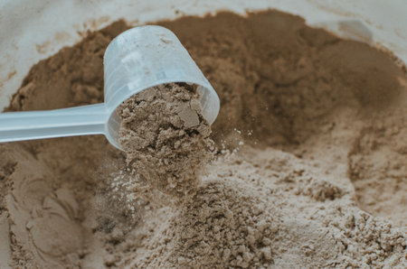 Protein powder and protein drinks with scoops. Nutritional supplement for athletesの写真素材