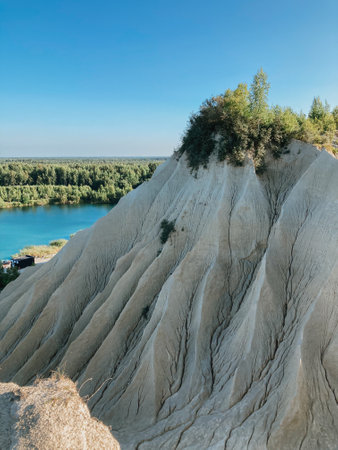 Big sand mountain with blue sea background at summer warm day in Estoniaの写真素材