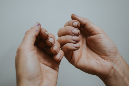 Woman's hands after gardening with dirt under her nails.の写真素材