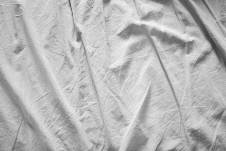 crumpled beige cotton fabric for backgroundの写真素材