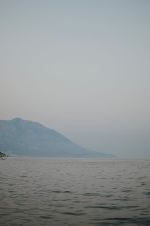 View of the evening mountains in Budva with the Adriatic sea in Montenegroの写真素材