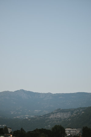 View of the evening mountains in Budva with the sea in Montenegroの写真素材