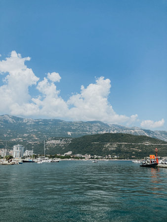 pier with boats and yachts for moving on water in Tivat, Montenegroの写真素材
